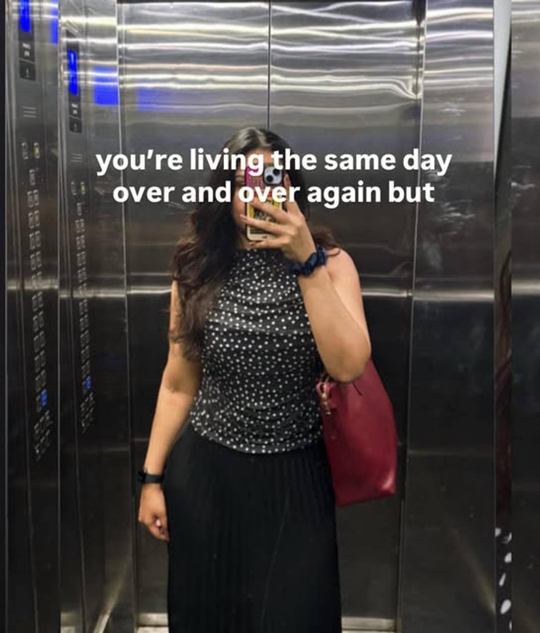 Lift mirror selfie in a polka print top